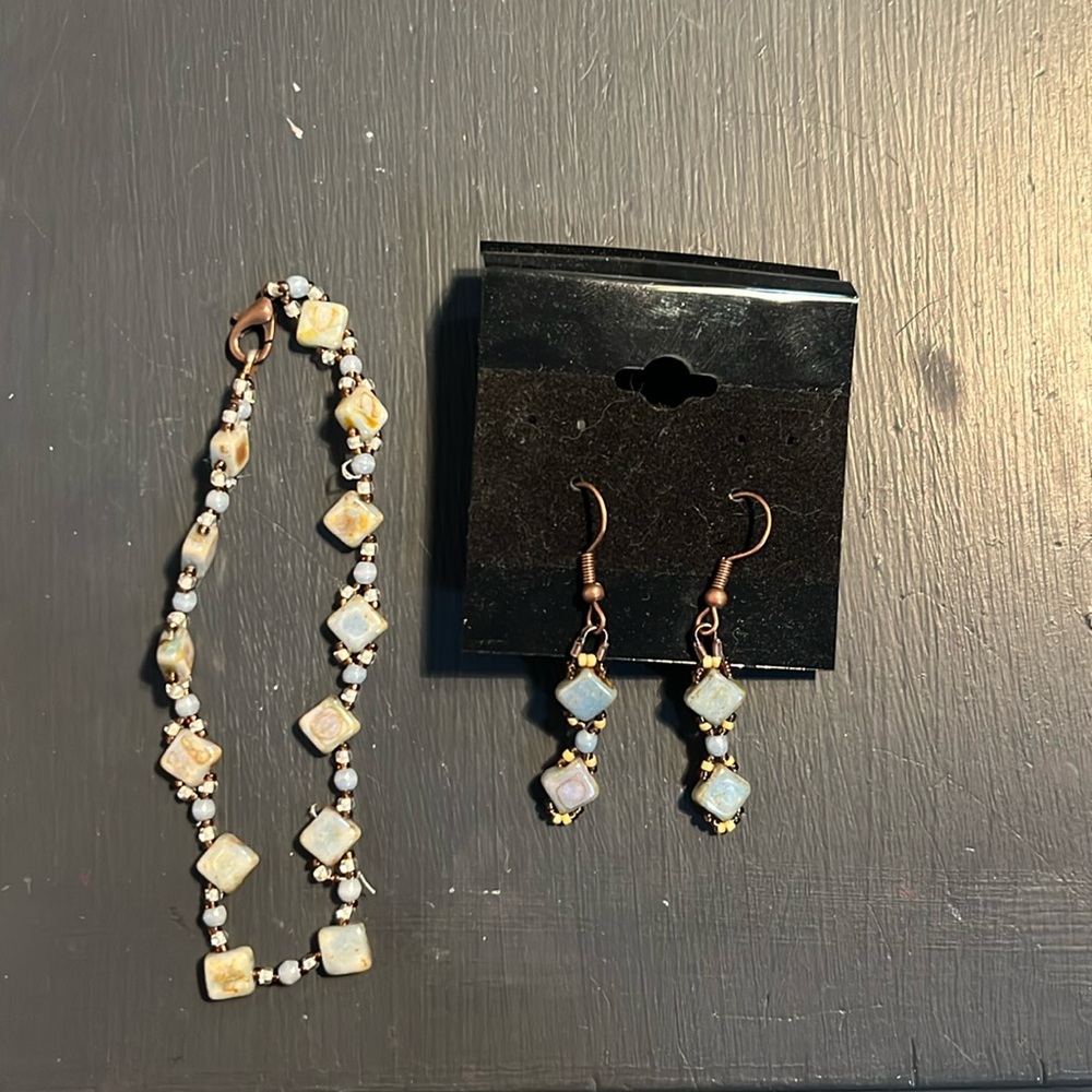 A set: bracelet and earring.